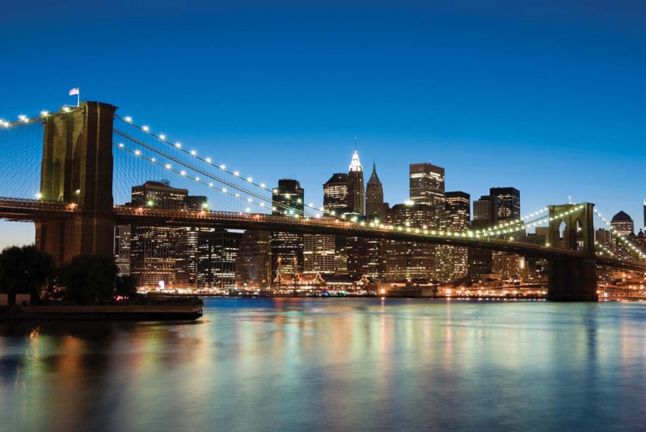 A era das grandes pontes de <a href="https://viajeaqui.abril.com.br/cidades/estados-unidos-nova-york" rel="Nova York" target="_blank">Nova York</a> começou com a inauguração, em 1883, da ligação do Brooklyn a Manhattan. Foi a primeira ponte de aço suspensa do mundo
