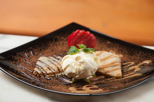Minicrepes recheados, com creme de chocolate meio amargo e doce de leite argentino, acompanhados de uma bola de sorvete de creme, é a sugestão de sobremesa no jantar do <a href="https://viajeaqui.abril.com.br/estabelecimentos/br-mg-belo-horizonte-restaurante-68-la-pizzeria" rel="68 La Pizzeria"><strong>68 La Pizzeria</strong></a>, durante a Belo Horizonte Restaurant Week Minicrepes recheados, com creme de chocolate meio amargo e doce de leite argentino, acompanhados de uma bola de sorvete de creme, é a sugestão de sobremesa no jantar do <a href="https://viajeaqui.abril.com.br/estabelecimentos/br-mg-belo-horizonte-restaurante-68-la-pizzeria" rel="68 La Pizzeria"><strong>68 La Pizzeria</strong></a>, durante a Belo Horizonte Restaurant Week