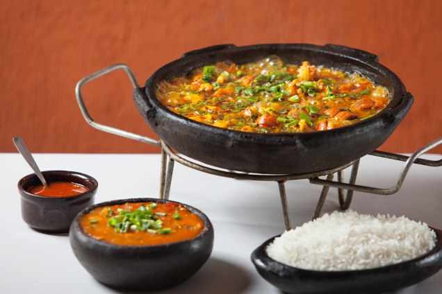 A moqueca de lagosta acompanhada de arroz e pirão é uma das sugestões do <a href="https://viajeaqui.abril.com.br/estabelecimentos/br-mg-belo-horizonte-restaurante-badejo" rel="Badejo"><strong>Badejo</strong></a> para a Belo Horizonte Restaurant Week 