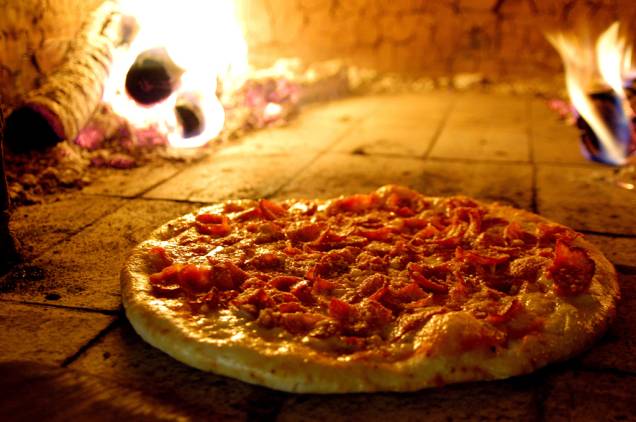 Saborear uma pizza em São Paulo é quase uma regra, ou melhor, parada obrigatória Saborear uma pizza em São Paulo é quase uma regra, ou melhor, parada obrigatória