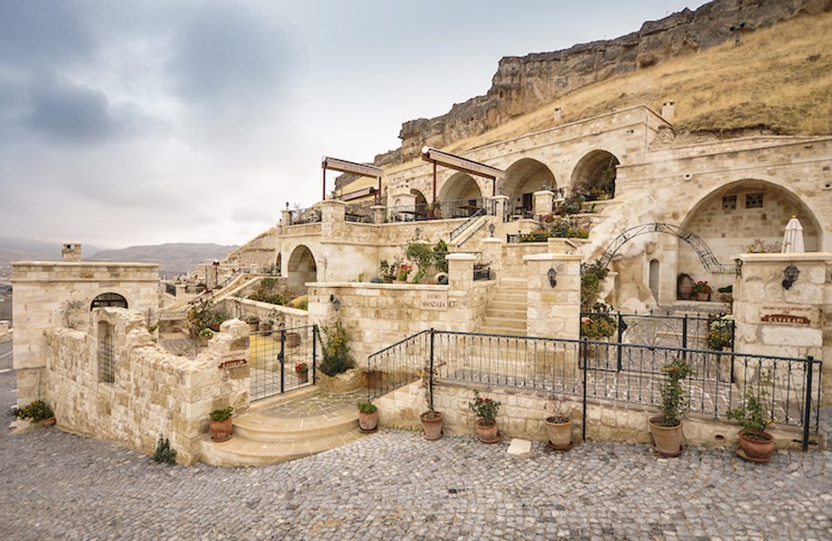 <strong>24. Kayakapi Premium Caves, Capadócia, <a href="https://viajeaqui.abril.com.br/paises/turquia/fotos" rel="Turquia" target="_blank">Turquia</a></strong>O grande atrativo do hotel são seus quartos feitos nas icônicas cavernas da Capadócia - patrimônio mundial da UNESCO - que foram transformadas em luxuosos aposentos. Mês mais barato para se hospedar: Fevereiro