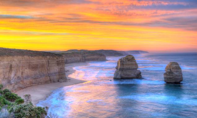 <strong><a href="https://parkweb.vic.gov.au/explore/parks/port-campbell-national-park" target="_blank" rel="noopener">Parque Nacional de Port Campbell</a>, Austrália:</strong> A região do parque é marcada por muitas formações rochosas e de calcário. Um dos grandes destaques é a formação conhecida como Os Doze Apóstolos, que encanta os visitantes com seu belo cenário <em><a href="https://www.booking.com/searchresults.pt-br.html?aid=332455&sid=b6bf542626b1a2c7a9951e44506f270a&sb=1&src=searchresults&src_elem=sb&error_url=https%3A%2F%2Fwww.booking.com%2Fsearchresults.pt-br.html%3Faid%3D332455%3Bsid%3Db6bf542626b1a2c7a9951e44506f270a%3Btmpl%3Dsearchresults%3Bac_click_type%3Db%3Bac_position%3D0%3Bcity%3D900048832%3Bclass_interval%3D1%3Bdest_id%3D-2652622%3Bdest_type%3Dcity%3Bdtdisc%3D0%3Bfrom_sf%3D1%3Bgroup_adults%3D2%3Bgroup_children%3D0%3Binac%3D0%3Bindex_postcard%3D0%3Blabel_click%3Dundef%3Bno_rooms%3D1%3Boffset%3D0%3Bpostcard%3D0%3Braw_dest_type%3Dcity%3Broom1%3DA%252CA%3Bsb_price_type%3Dtotal%3Bsearch_selected%3D1%3Bshw_aparth%3D1%3Bslp_r_match%3D0%3Bsrc%3Dsearchresults%3Bsrc_elem%3Dsb%3Bsrpvid%3D50e57f007eb90035%3Bss%3DParque%2520Nacional%2520Skaftafell%252C%2520Su%25C3%25B0urland%2520%2528sur%2520de%2520Islandia%2529%252C%2520Islandia%3Bss_all%3D0%3Bss_raw%3DParque%2520Nacional%2520de%2520Vatnaj%25C3%25B6kull%3Bssb%3Dempty%3Bsshis%3D0%3Bssne%3DTorres%2520del%2520Paine%3Bssne_untouched%3DTorres%2520del%2520Paine%3Btop_ufis%3D1%26%3B&ss=Parque+Nacional+de+Port+Campbell%2C+Great+Ocean+Road%2C+Port+Campbell+VIC%2C+Australia&is_ski_area=&ssne=Skaftafell&ssne_untouched=Skaftafell&city=-2652622&checkin_monthday=&checkin_month=&checkin_year=&checkout_monthday=&checkout_month=&checkout_year=&group_adults=2&group_children=0&no_rooms=1&from_sf=1&ss_raw=Parque+Nacional+de+Port+Campbell&ac_position=1&ac_click_type=g&dest_id=ChIJi9D2osOfgqoRpdIxt4MNGec&dest_type=landmark&place_id=ChIJi9D2osOfgqoRpdIxt4MNGec&place_id_lat=-38.6445019&place_id_lon=143.0607731&place_types=tourist_attraction%2Cpark%2Cpoint_of_interest%2Cestablishment&search_pageview_id=50e57f007eb90035&search_selected=true" target="_blank" rel="noopener">Veja preços de hotéis em Port Campbell no Booking.com</a></em> <strong><a href="https://parkweb.vic.gov.au/explore/parks/port-campbell-national-park" target="_blank" rel="noopener">Parque Nacional de Port Campbell</a>, Austrália:</strong> A região do parque é marcada por muitas formações rochosas e de calcário. Um dos grandes destaques é a formação conhecida como Os Doze Apóstolos, que encanta os visitantes com seu belo cenário <em><a href="https://www.booking.com/searchresults.pt-br.html?aid=332455&sid=b6bf542626b1a2c7a9951e44506f270a&sb=1&src=searchresults&src_elem=sb&error_url=https%3A%2F%2Fwww.booking.com%2Fsearchresults.pt-br.html%3Faid%3D332455%3Bsid%3Db6bf542626b1a2c7a9951e44506f270a%3Btmpl%3Dsearchresults%3Bac_click_type%3Db%3Bac_position%3D0%3Bcity%3D900048832%3Bclass_interval%3D1%3Bdest_id%3D-2652622%3Bdest_type%3Dcity%3Bdtdisc%3D0%3Bfrom_sf%3D1%3Bgroup_adults%3D2%3Bgroup_children%3D0%3Binac%3D0%3Bindex_postcard%3D0%3Blabel_click%3Dundef%3Bno_rooms%3D1%3Boffset%3D0%3Bpostcard%3D0%3Braw_dest_type%3Dcity%3Broom1%3DA%252CA%3Bsb_price_type%3Dtotal%3Bsearch_selected%3D1%3Bshw_aparth%3D1%3Bslp_r_match%3D0%3Bsrc%3Dsearchresults%3Bsrc_elem%3Dsb%3Bsrpvid%3D50e57f007eb90035%3Bss%3DParque%2520Nacional%2520Skaftafell%252C%2520Su%25C3%25B0urland%2520%2528sur%2520de%2520Islandia%2529%252C%2520Islandia%3Bss_all%3D0%3Bss_raw%3DParque%2520Nacional%2520de%2520Vatnaj%25C3%25B6kull%3Bssb%3Dempty%3Bsshis%3D0%3Bssne%3DTorres%2520del%2520Paine%3Bssne_untouched%3DTorres%2520del%2520Paine%3Btop_ufis%3D1%26%3B&ss=Parque+Nacional+de+Port+Campbell%2C+Great+Ocean+Road%2C+Port+Campbell+VIC%2C+Australia&is_ski_area=&ssne=Skaftafell&ssne_untouched=Skaftafell&city=-2652622&checkin_monthday=&checkin_month=&checkin_year=&checkout_monthday=&checkout_month=&checkout_year=&group_adults=2&group_children=0&no_rooms=1&from_sf=1&ss_raw=Parque+Nacional+de+Port+Campbell&ac_position=1&ac_click_type=g&dest_id=ChIJi9D2osOfgqoRpdIxt4MNGec&dest_type=landmark&place_id=ChIJi9D2osOfgqoRpdIxt4MNGec&place_id_lat=-38.6445019&place_id_lon=143.0607731&place_types=tourist_attraction%2Cpark%2Cpoint_of_interest%2Cestablishment&search_pageview_id=50e57f007eb90035&search_selected=true" target="_blank" rel="noopener">Veja preços de hotéis em Port Campbell no Booking.com</a></em>