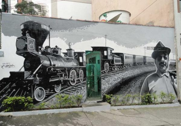 Adoniran Barbosa e seu famoso Trem das Onze, na Praça Benedito Calixto, em Pinheiros