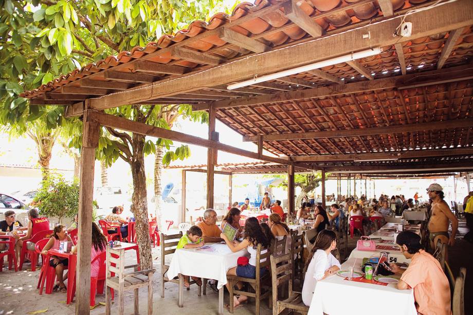 Restaurante <a href="https://viajeaqui.abril.com.br/estabelecimentos/br-rn-natal-restaurante-toca-do-caranguejo" rel="Toca do Caranguejo">Toca do Caranguejo</a>, em Natal, no Rio Grande do Norte. A melhor pedida do cardápio é o caranguejo fcozido em molho à base de tomate, leite de coco e coentro