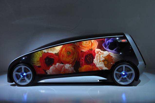 O curioso conceito Toyota Fun-Vii muda de aparência conforme o ambiente e interage com outros carros, pretendendo ser um exemplo em conectividade. Para muitos, é quase um smartphone sobre rodas O curioso conceito Toyota Fun-Vii muda de aparência conforme o ambiente e interage com outros carros, pretendendo ser um exemplo em conectividade. Para muitos, é quase um smartphone sobre rodas