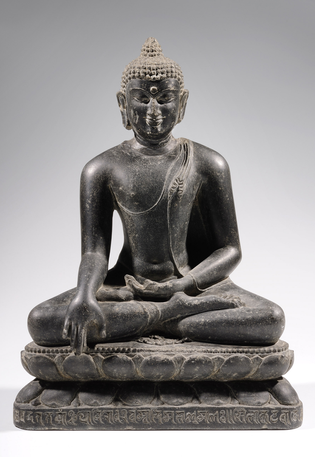 Escultura que representa Buda no momento de sua iluminação