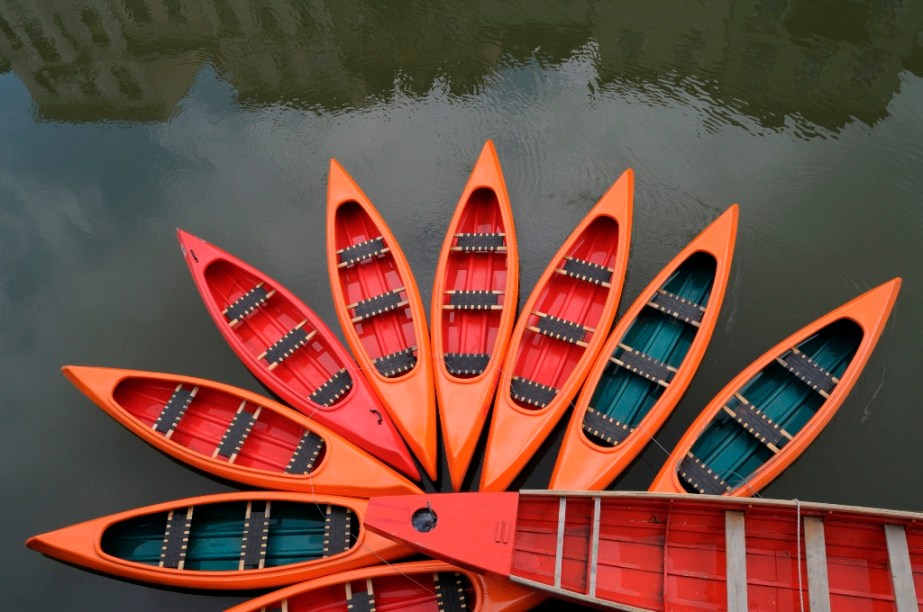 Botes no rio Liublianica, em Liubliana