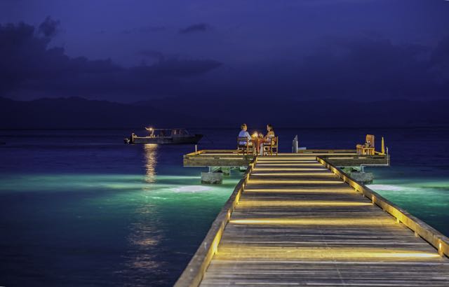 pier-lit-at-night