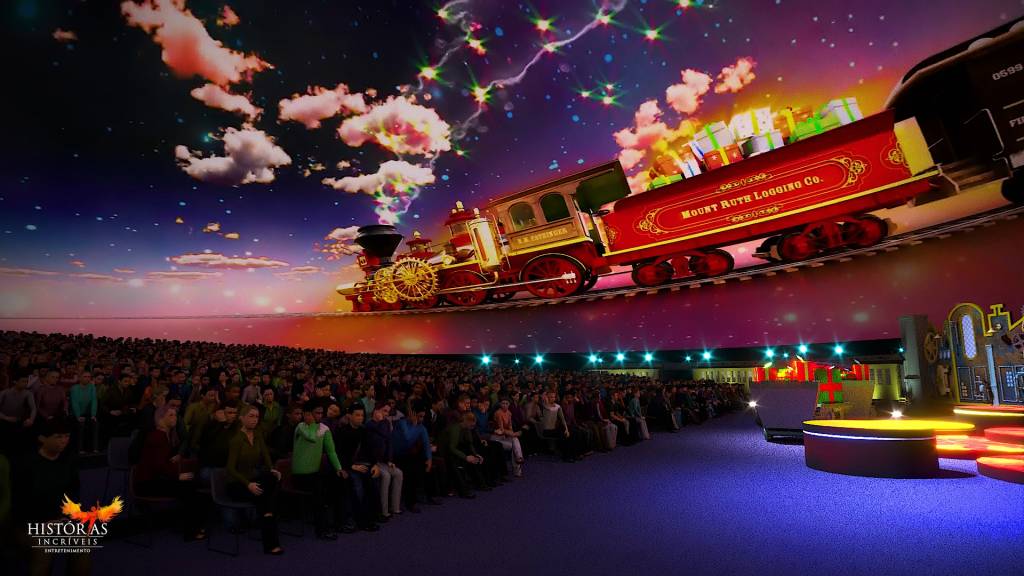 A imagem mostra um projeto com pessoas em um auditório e um trem sendo projetado na parede